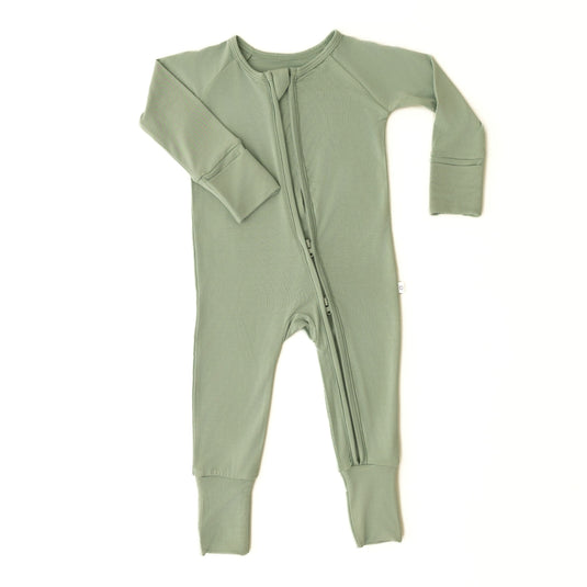 Flat lay of Frosted Sage bamboo baby sleeper – featuring a soothing sage-green color on ultra-soft bamboo baby clothes. These baby sleepers are a luxurious and affordable baby shower gift.