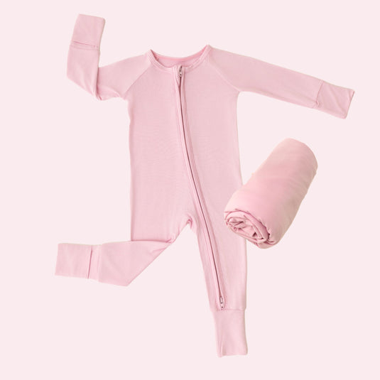 Petal Glow | Everyday Essentials Bundle in Petal Glow, features ultra-soft bamboo baby pajamas and stretchy swaddle blankets. A top choice in bamboo baby clothes and perfect baby shower gifts.
