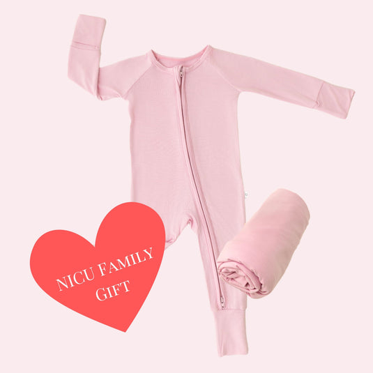 Thoughtful Giver Set in Petal Glow, featuring ultra-soft bamboo sleeper, stretchy swaddle blanket, and a baby onesie donated to a NICU family. A top choice in bamboo baby clothes and for meaningful baby shower gifts.