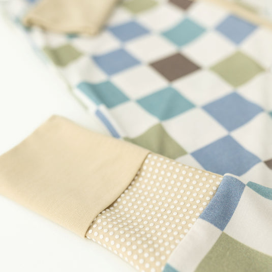 Close-up of Luxe Checker bamboo baby sleeper – highlighting the premium stretch and breathable fabric. A must-have in bamboo baby clothes and a great baby shower gift.