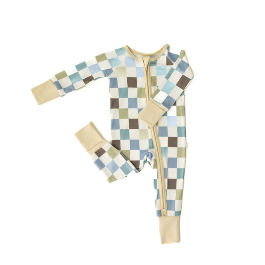 Flat lay of Luxe Checker baby onesies, featuring a modern checkerboard print. A stylish baby onesies are a great choice in bamboo baby clothes and perfect baby shower gifts.