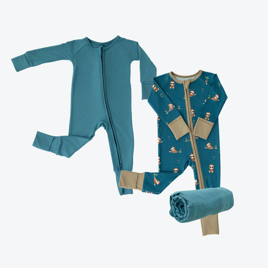 Luxe Baby Sloth | Luxury Baby Shower Gift Set in Sleepy Sloth and Blue Charcoal, featuring two ultra-soft bamboo baby pajamas and one of our matching swaddle blankets. A cozy and thoughtful baby shower gift in bamboo baby clothes.