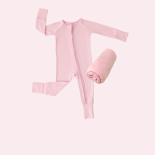 Petal Glow | Everyday Essentials Bundle in Petal Glow, features ultra-soft bamboo baby pajamas and stretchy swaddle blankets. A top choice in bamboo baby clothes and perfect baby shower gifts.